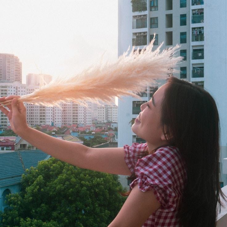 Portrait of Aria Kestrel, group coordinator and fusion cooking expert